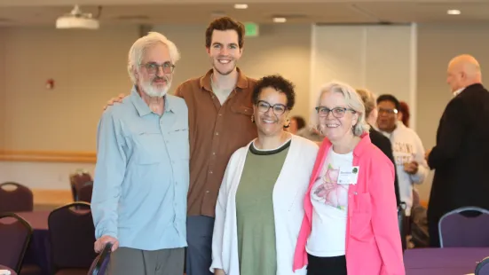 Dean Suzanne Lehman poses with retiree and her family