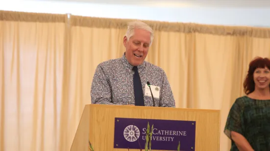 Cort Cieminski speaks at podium
