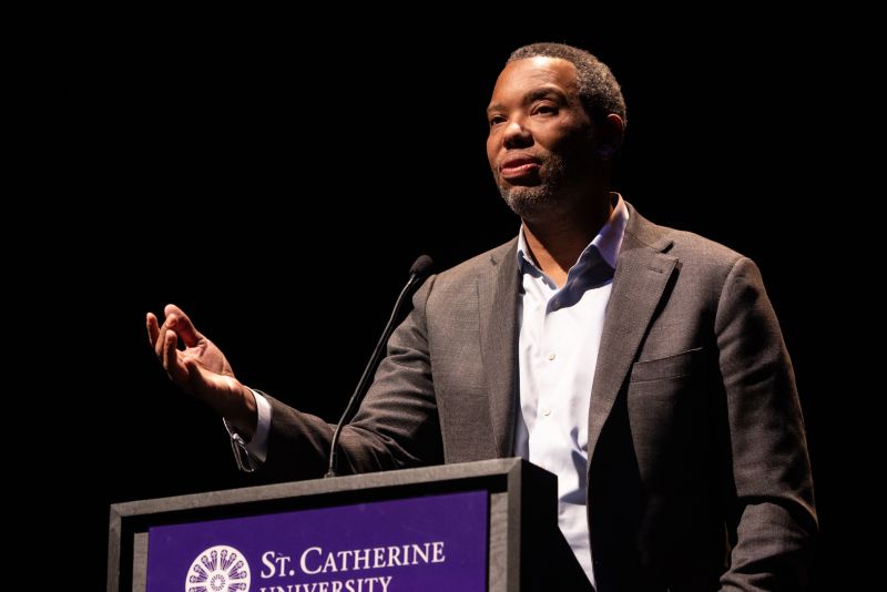 Ta-Nehisi Coates speaks at a lectern. 