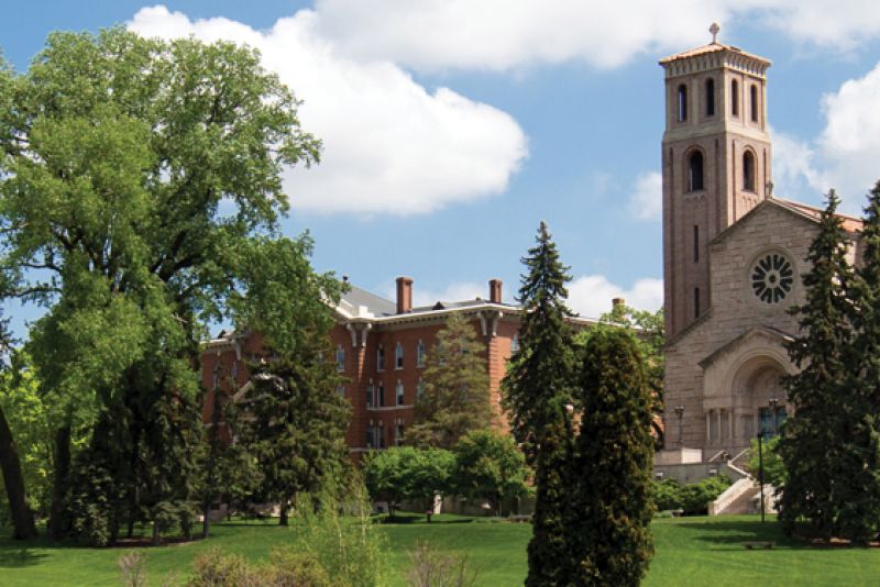 St. Catherine University campus with green trees, historic and modern buildings, and the Career Development Center logo