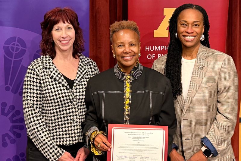 Provost Baird, President Evans, and Humphrey School Dean