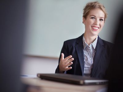 Business woman presenting in meeting