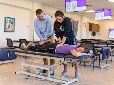 Physical Therapist student working with fellow student