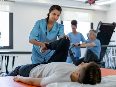 Physical Therapist student working with fellow student