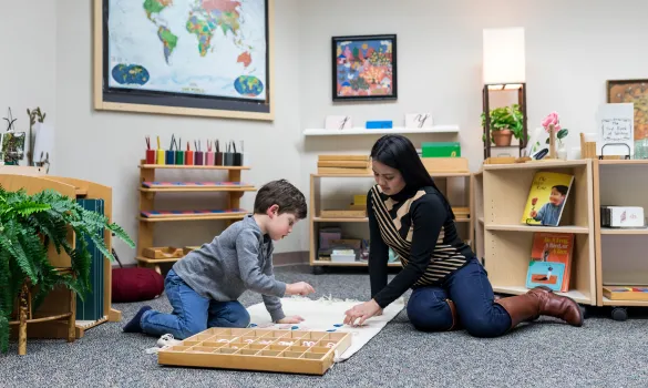 Montessori classroom image with student and teacher