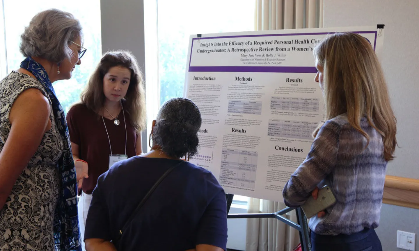 Students presenting their research poster at the 2017 Summer Scholars Showcase. Photo by Amy Mullowney '19