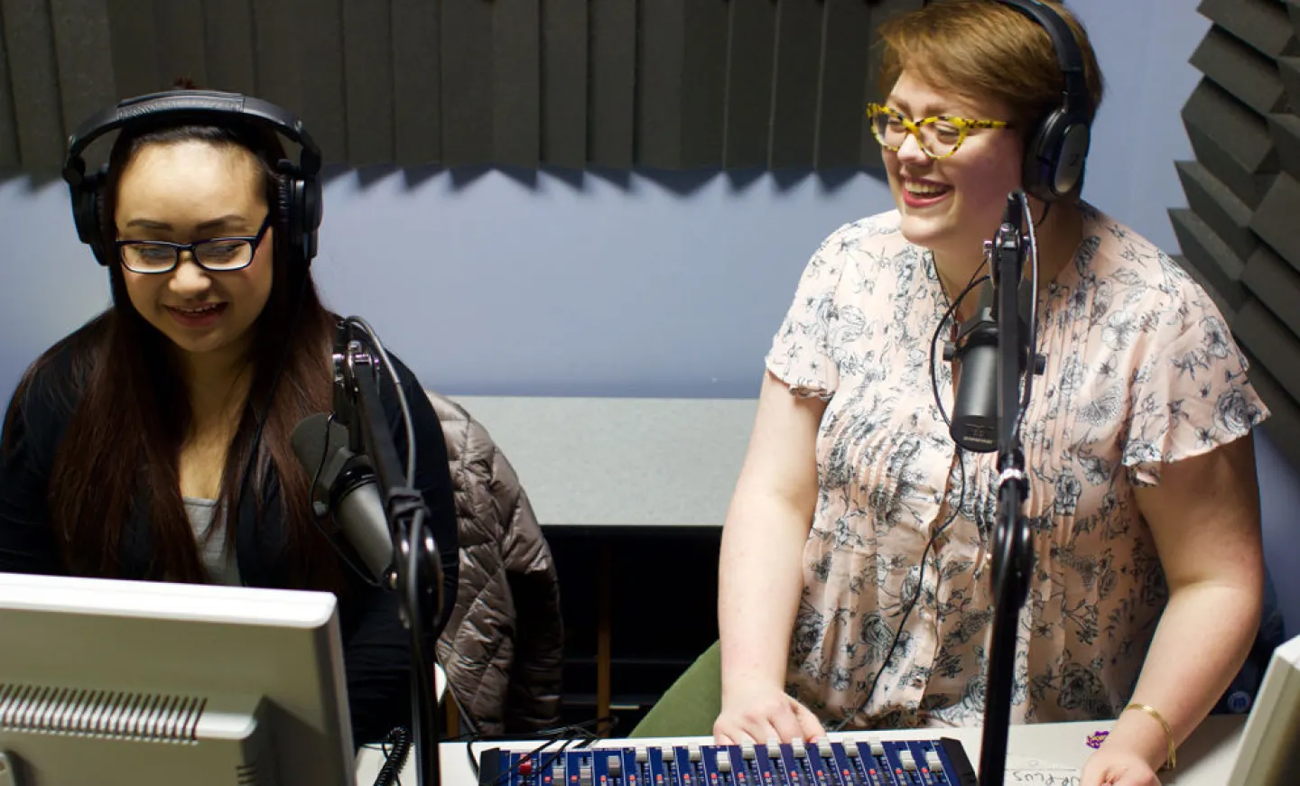 Pa Ying Vang '17 and Rocky Pierson '18, an electronic media student, work together on Pierson's Woman of Substance podcast series. Photo by Ryan Johnson '19.