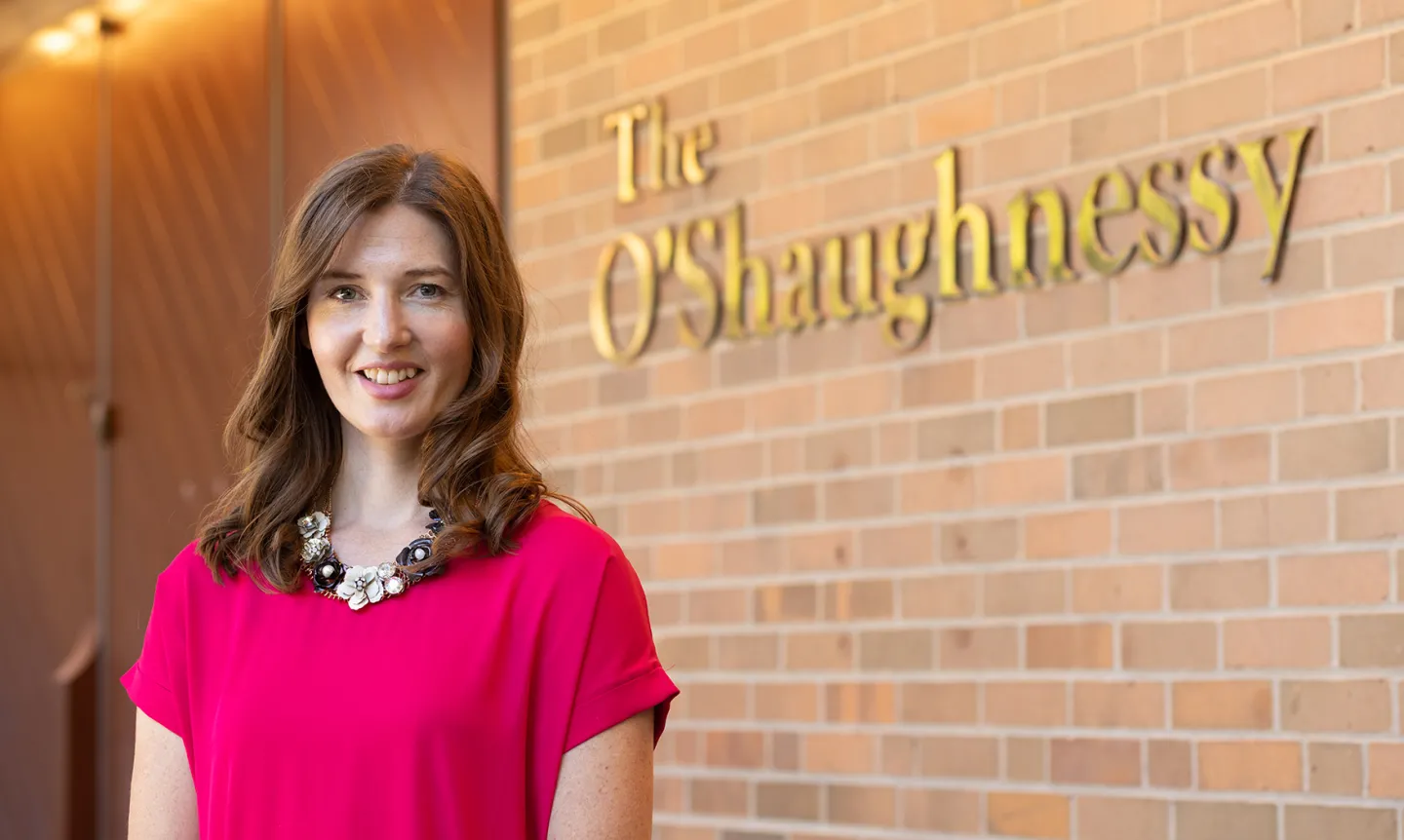 Irene Green stands in front of The O'Shaughnessy