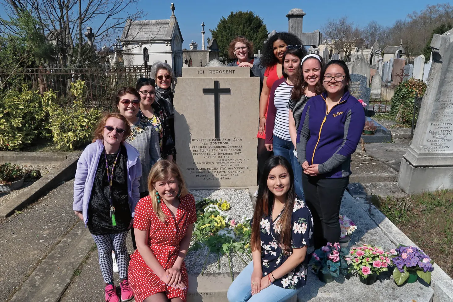 Students and faculty at the grave of mother St. John Fontbonne