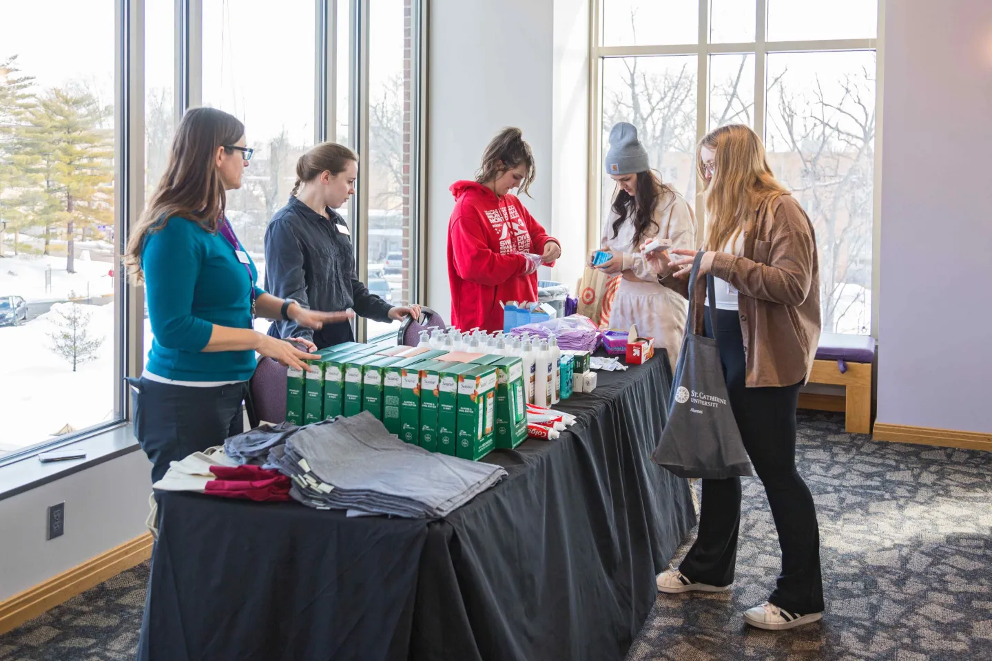 Students put together bags for a Feast of St. Joseph service project.