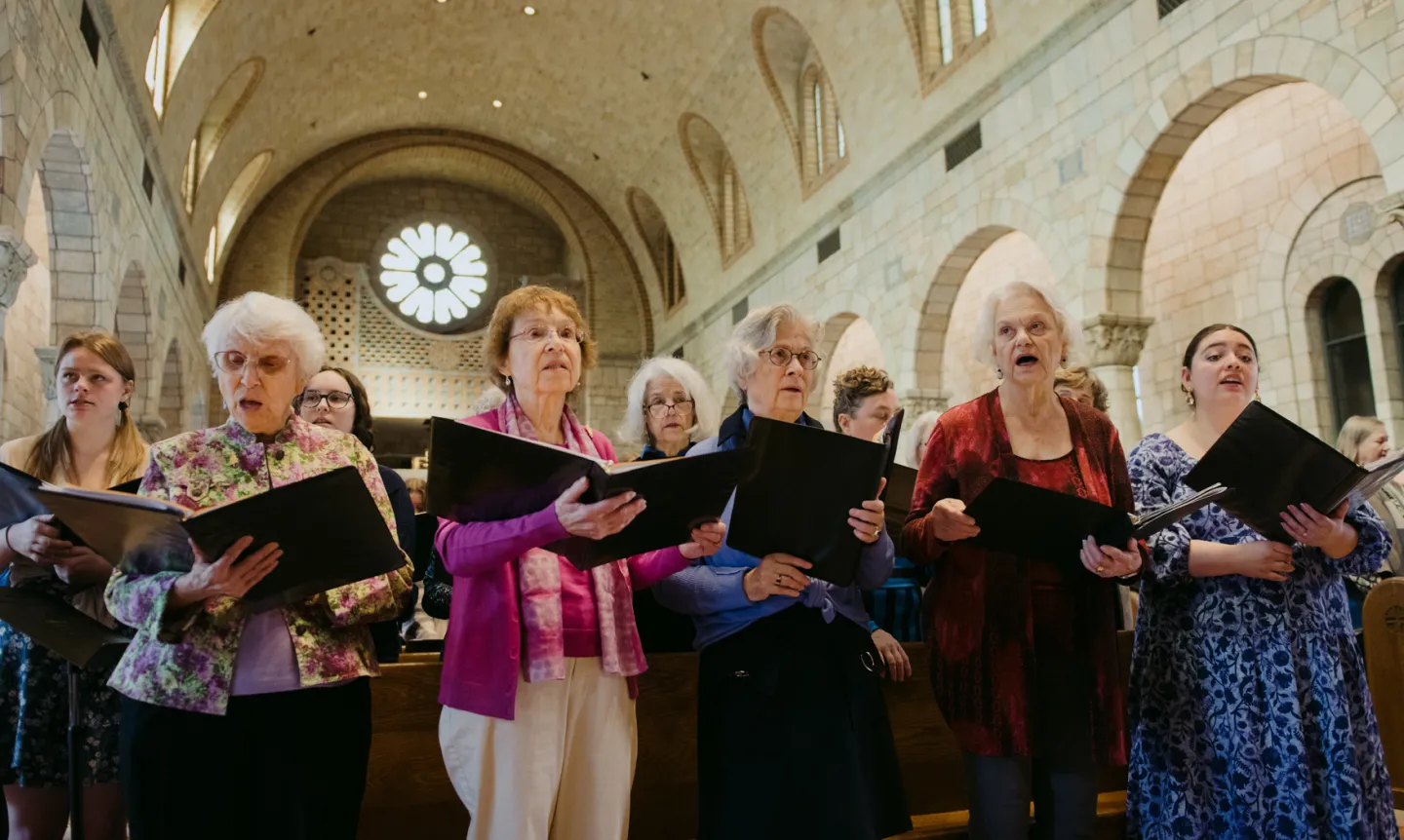 Members of the choir sing in the Chapel