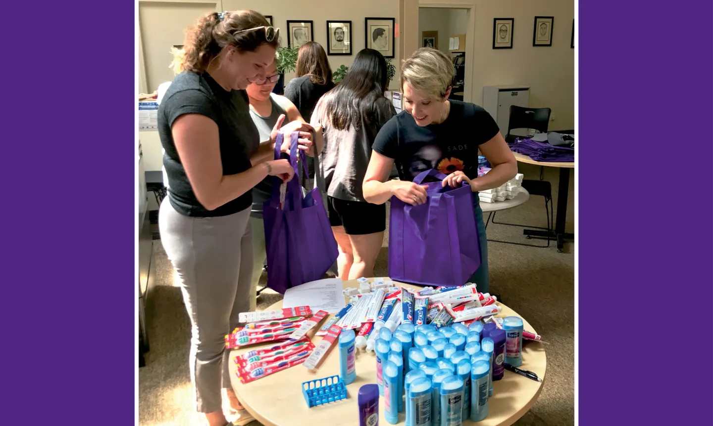 Physical therapy students putting together "welcome home bags."