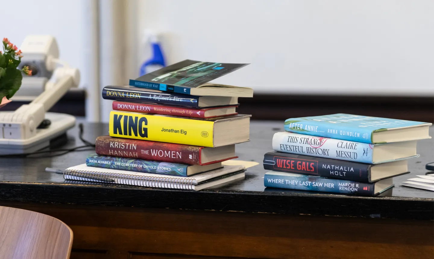 Books from the booklist displayed on table.