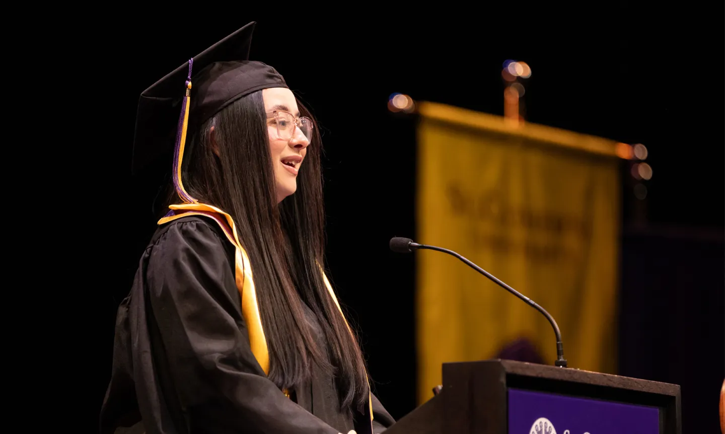 Jazmin Diaz-Jauregui ’26, College for Women Commencement speaker at the podium
