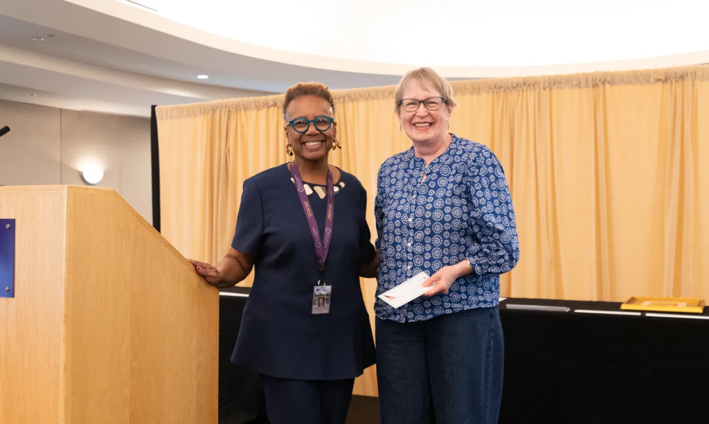 President Marcheta P. Evans, PhD, poses with awardee