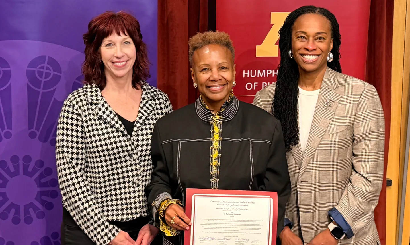 Provost Baird, President Evans, and Humphrey School Dean