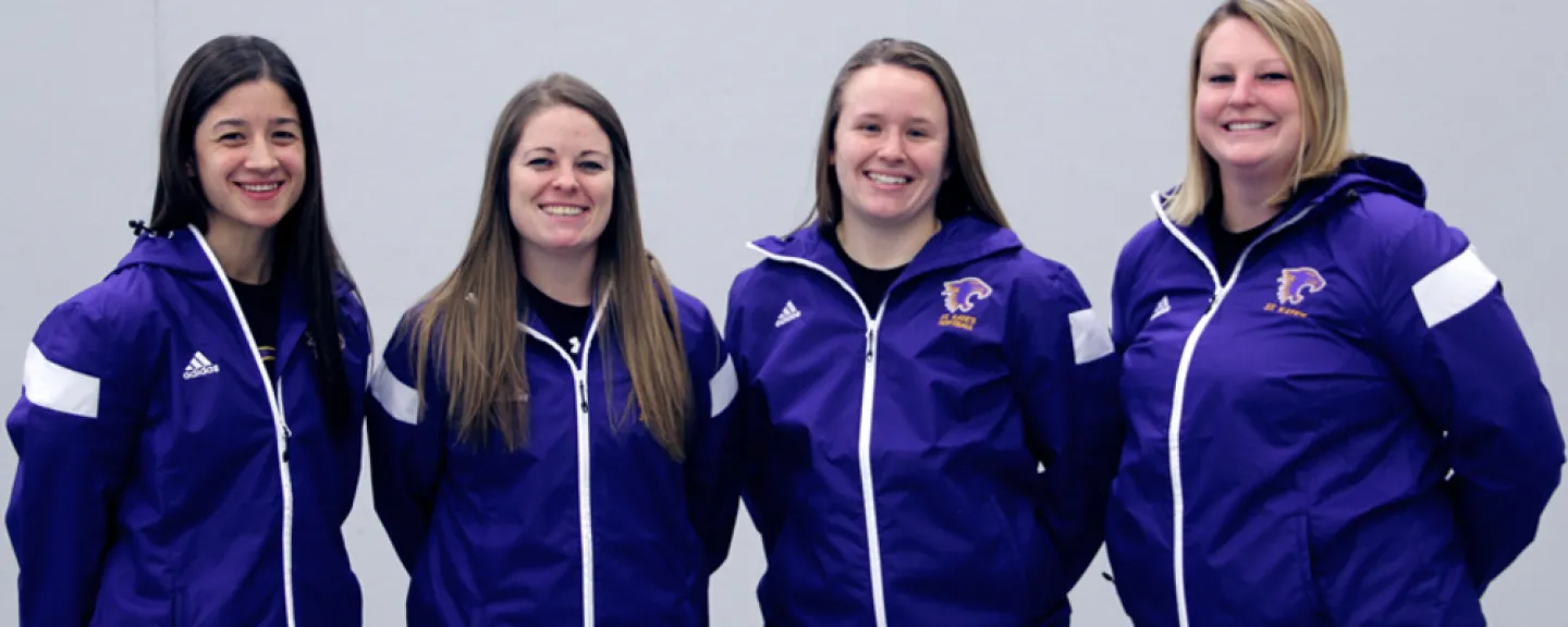 Four Wildcats softball coaches