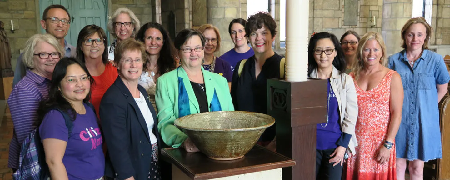 Representatives from the University Faculty Council honored President Andrea Lee, IHM, for her service to St. Catherine Universityby dedicating a baptismal font for use in Our Lady of Victory Chapel. Photo by Sharon Rolenc.