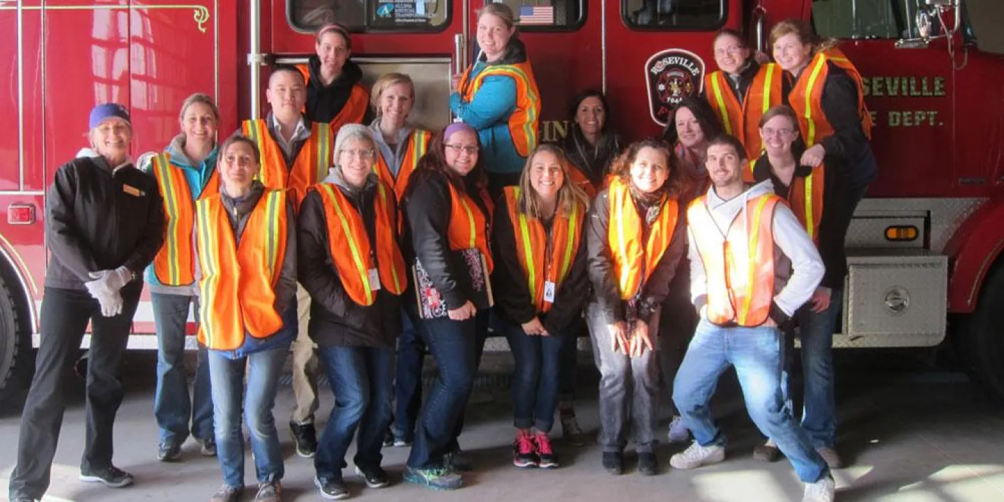 Students from St. Kate’s OT and OTA program put their occupational therapy skills to the test at a 2015 CarFit event at Roseville Fire Station. Photo supplied.