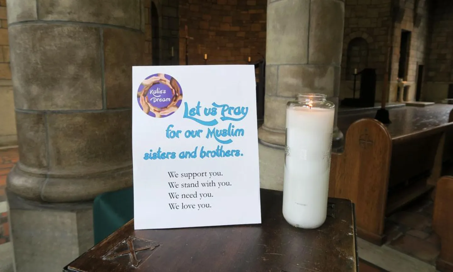 "Katies dream: Let us pray for our Muslim sisters and btothers. We support you. We stand with you. We need you. We love you." - sign in Our Lady of Victory Chapel, next to a candle